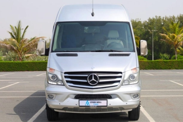 Sleek Front View of Mercedes Sprinter 22 Seater Rental.