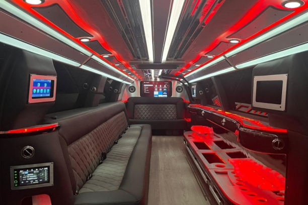 Group of people getting into a limousine at a Dubai hotel